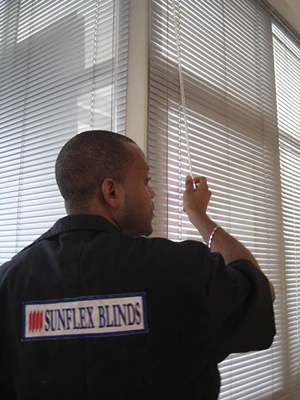 Sunflex Window Blinds Nigeria - Installers at work